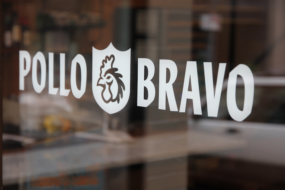 The Pollo Bravo logo on the front window