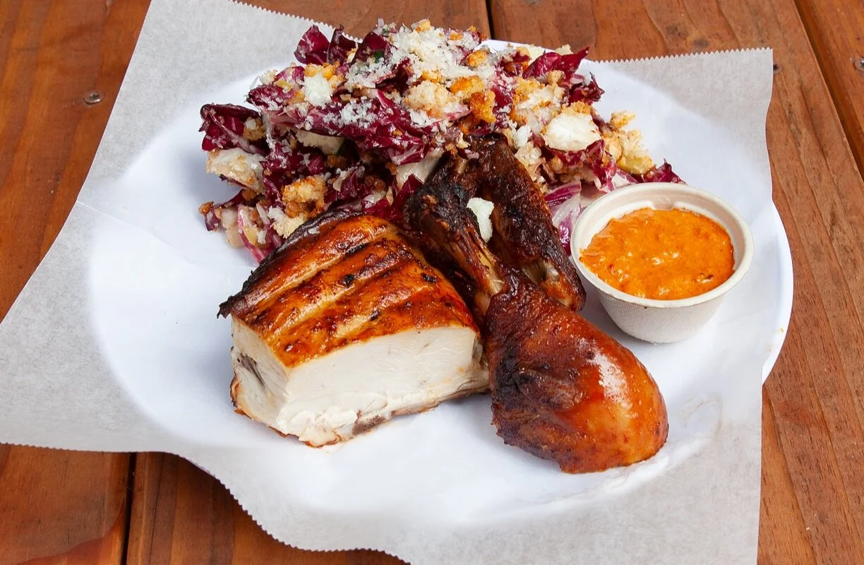 Winner Winner Chicken Dinner — half bird with sides and sauces